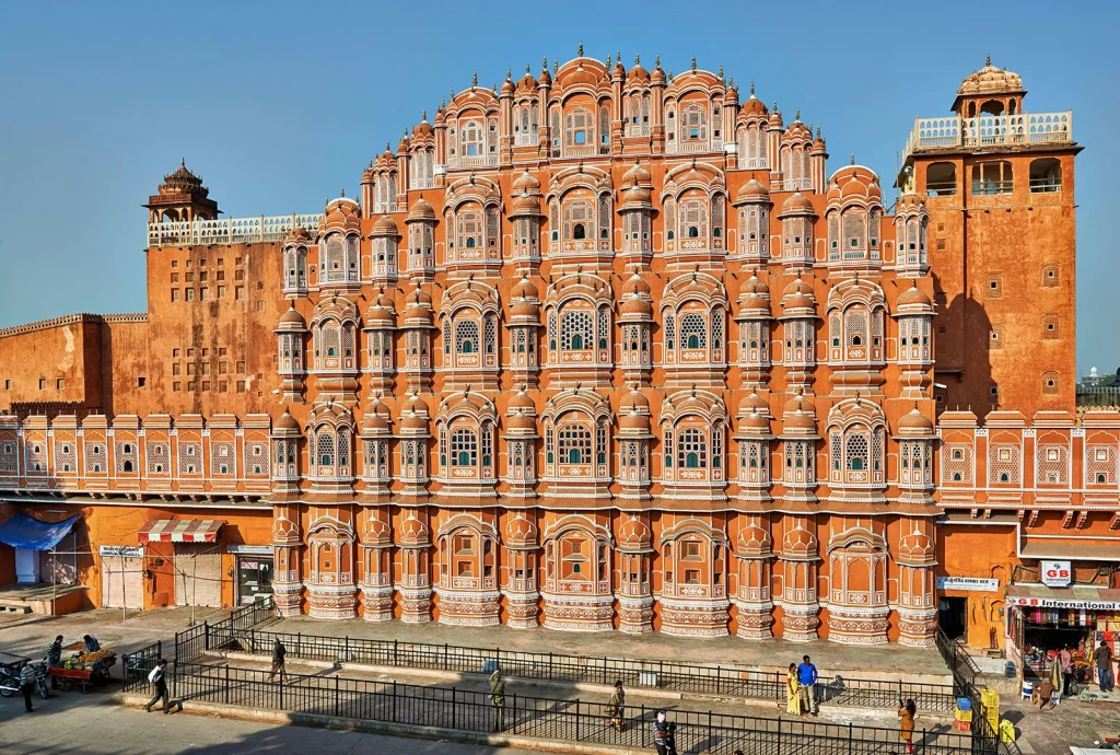 The Hawa Mahal is a palace in the city of Jaipur, Rajasthan, India. Built from red and pink sandstone, it is on the edge of the City Palace, Jaipur, and extends to the Zenana, or women's chambers.